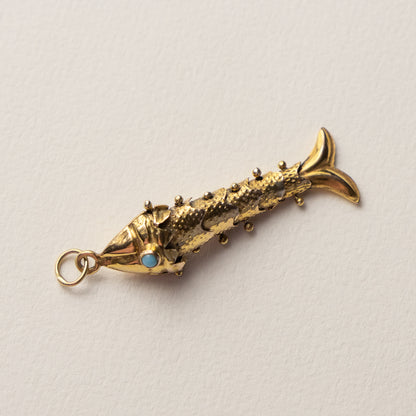 9 carat articulated fish pendant turqouis