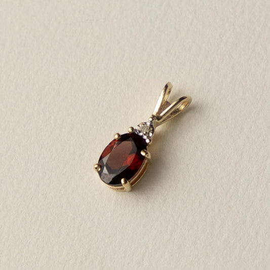 9ct garnet & diamond pendant