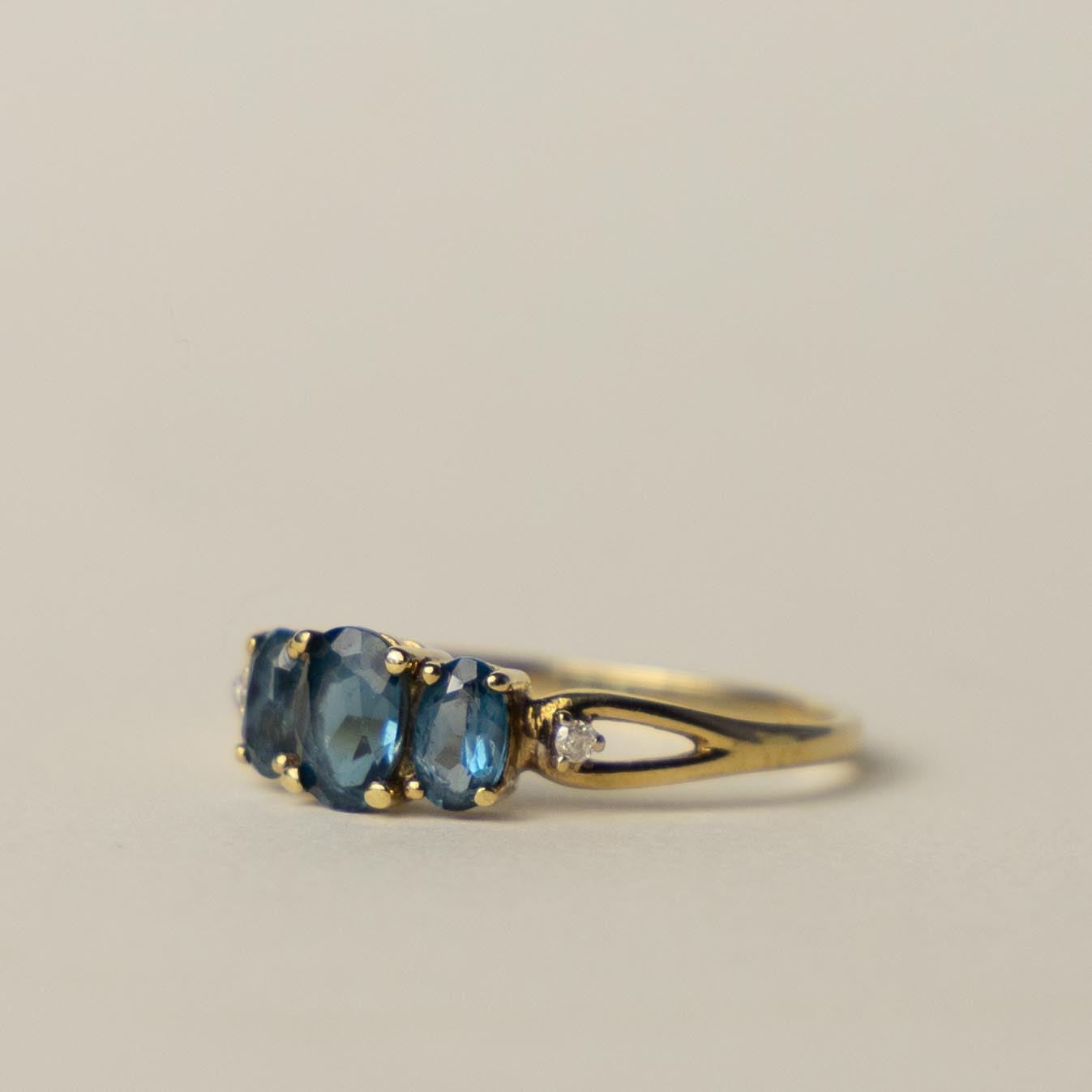 9ct blue topaz & diamond trilogy