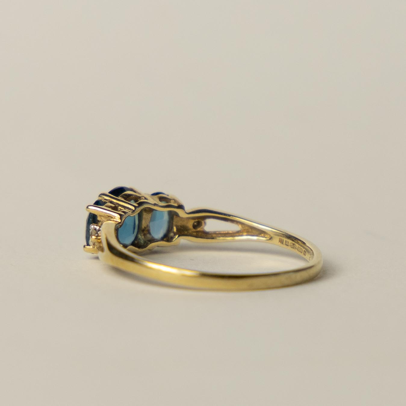 9ct blue topaz & diamond trilogy