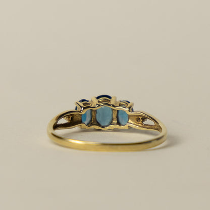 9ct blue topaz & diamond trilogy