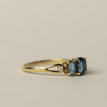 9ct blue topaz & diamond trilogy