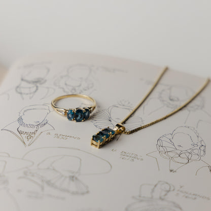 9ct blue topaz & diamond trilogy