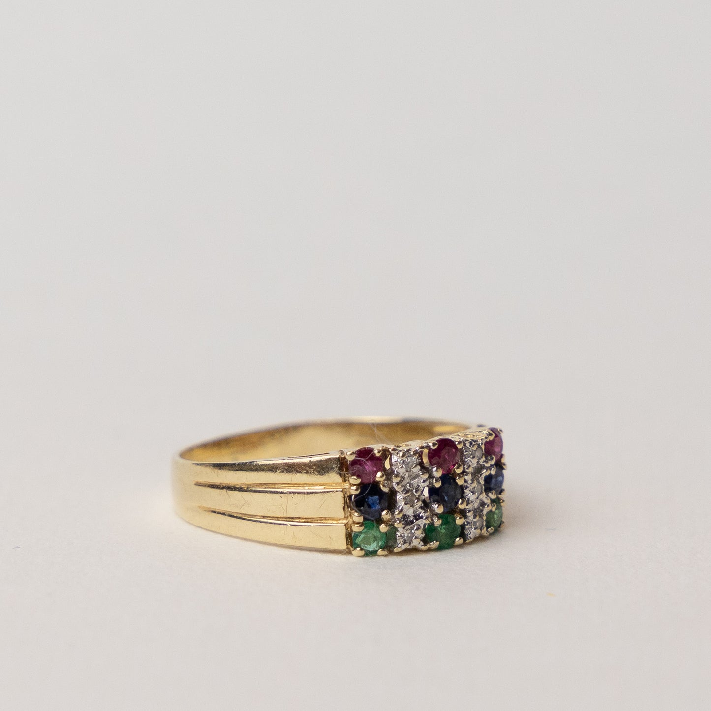 vintage 14 carat gold cocktail ring with diamonds and gemstones