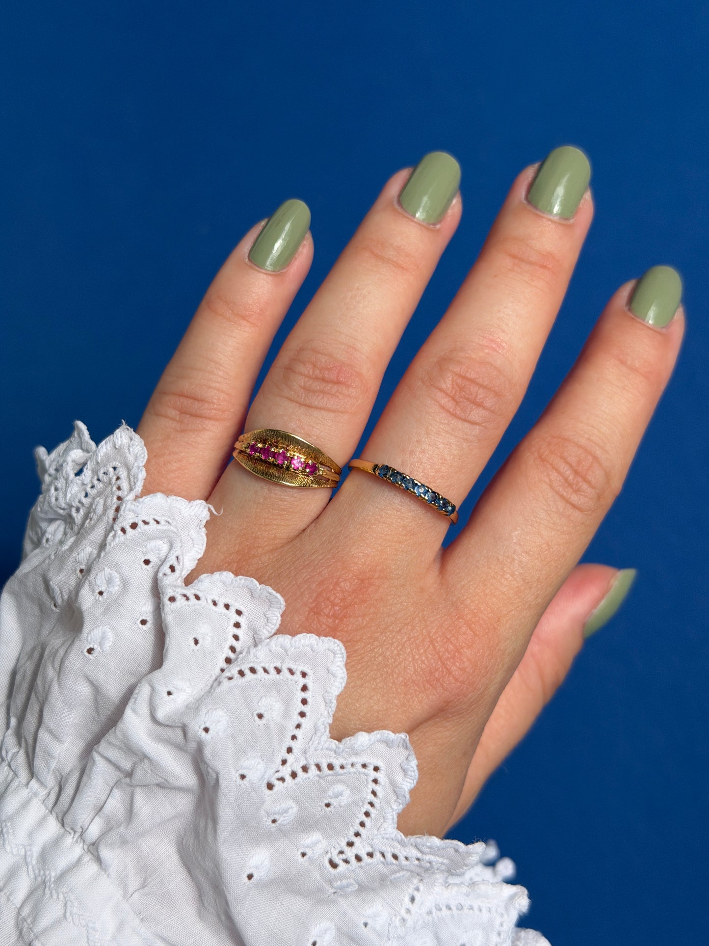 18ct saffire half eternity row ring