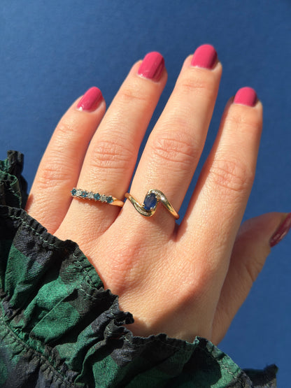 9ct blue topaz & diamond row ring