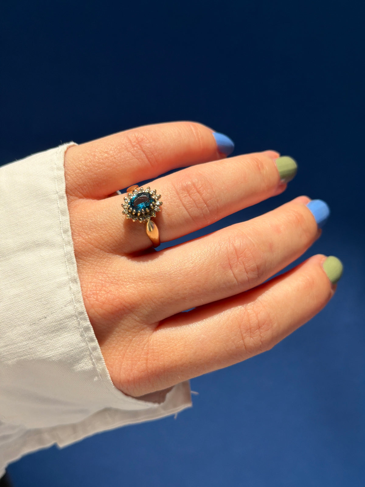 9ct Diana halo blue topaz & diamond