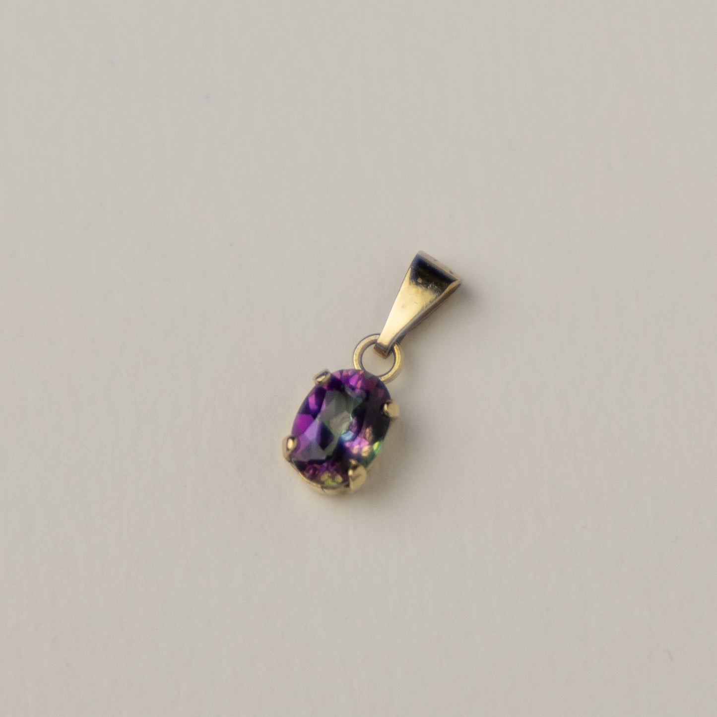 14 carat gold mystic topaz pendant