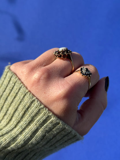 9 carat opal marquise garnet ring