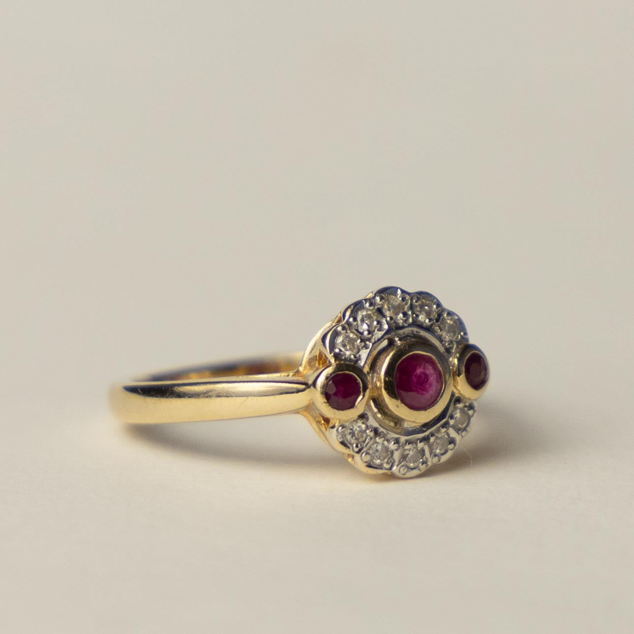 14ct diamond & ruby halo ring