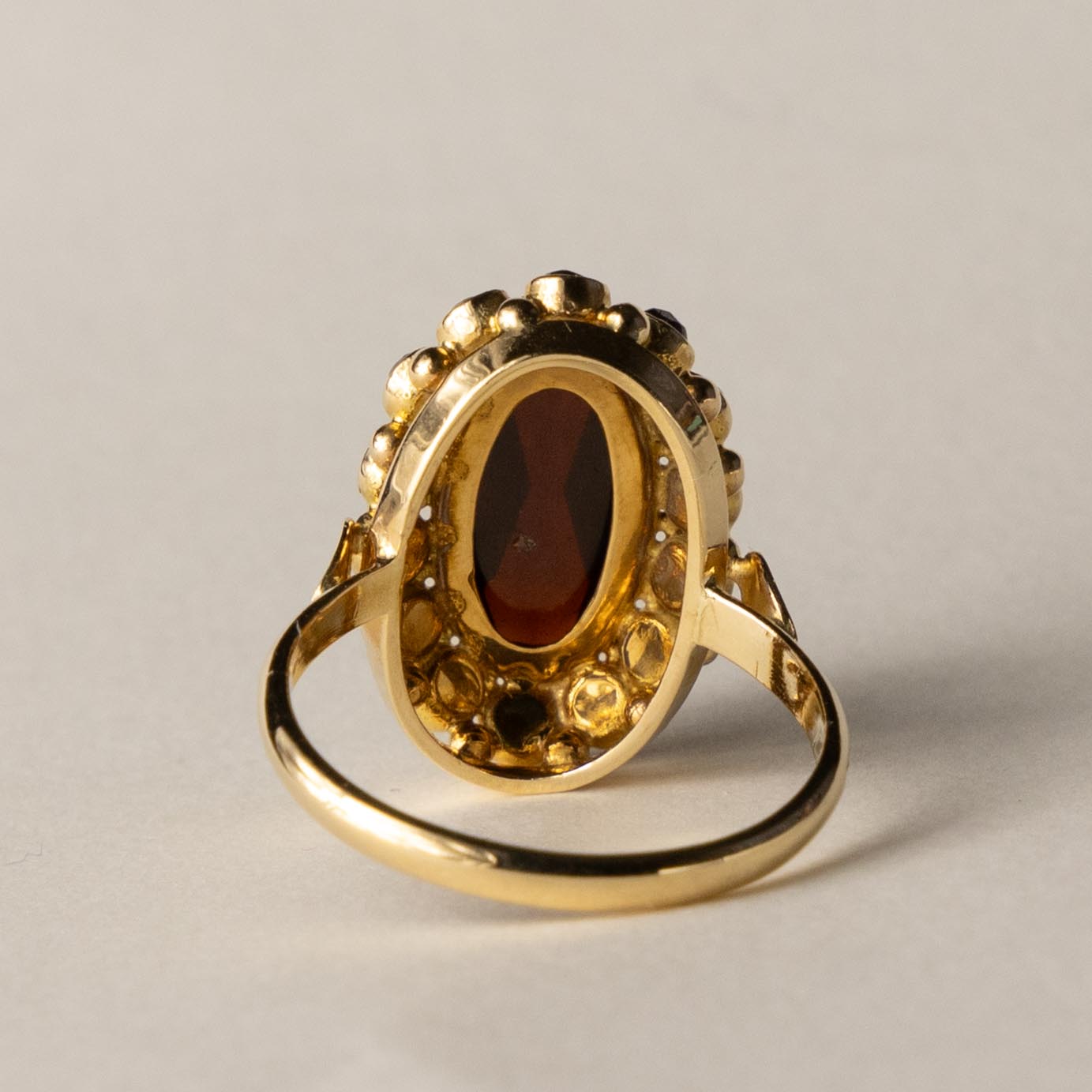 14ct garnet entourage ring