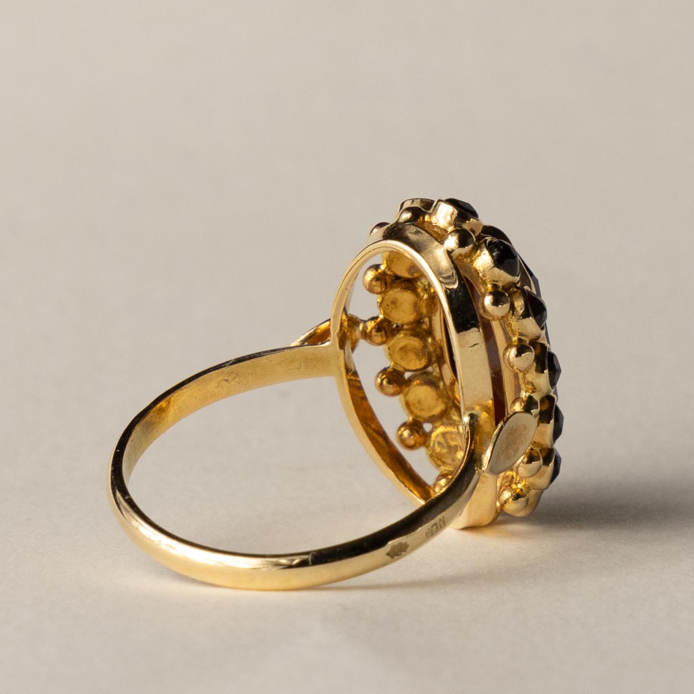 14ct garnet entourage ring