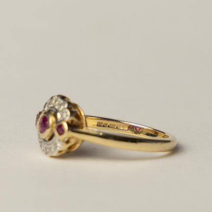 14ct diamond & ruby halo ring
