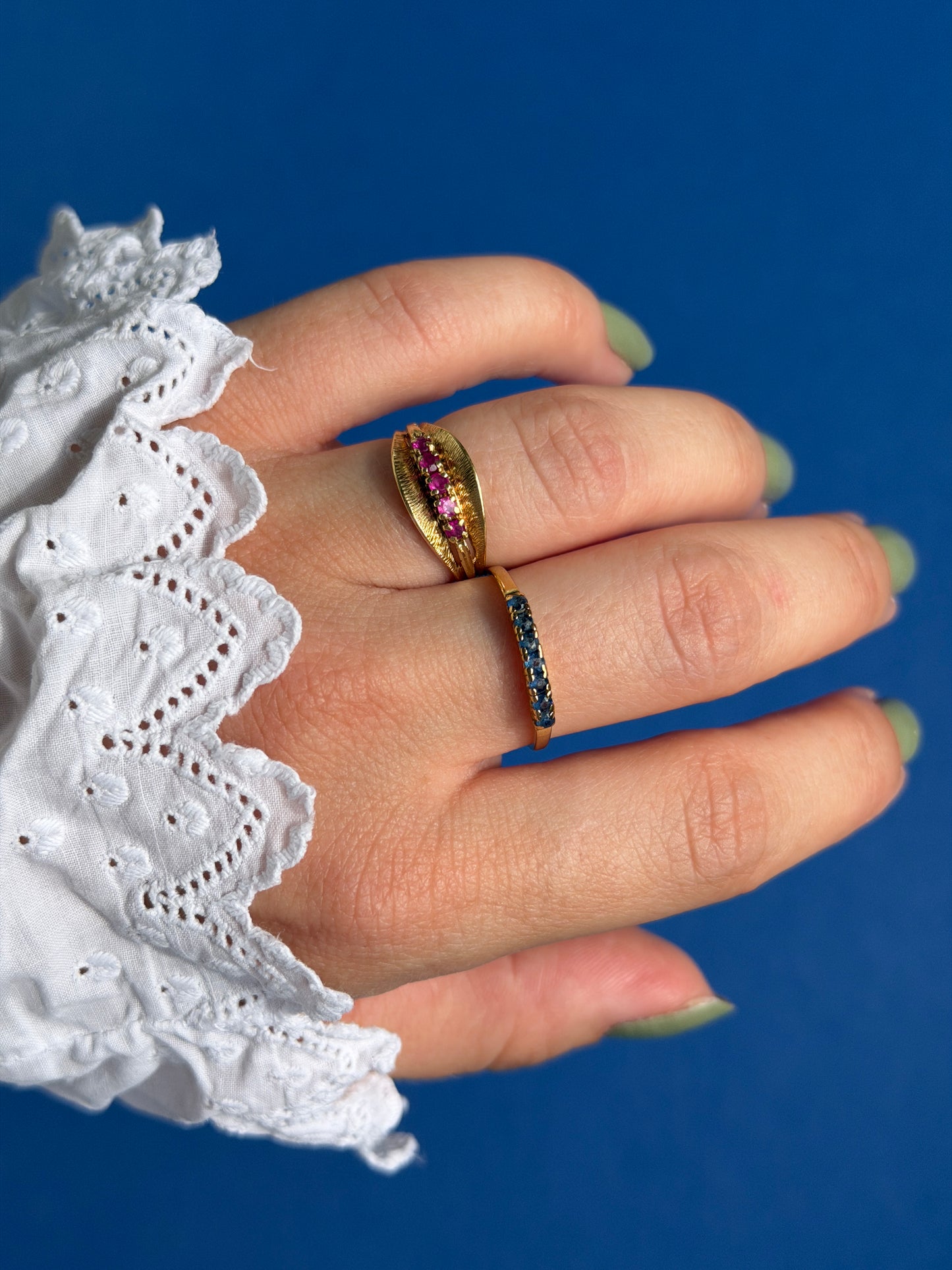 18ct saffire half eternity row ring