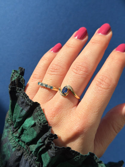 9ct blue topaz & diamond row ring