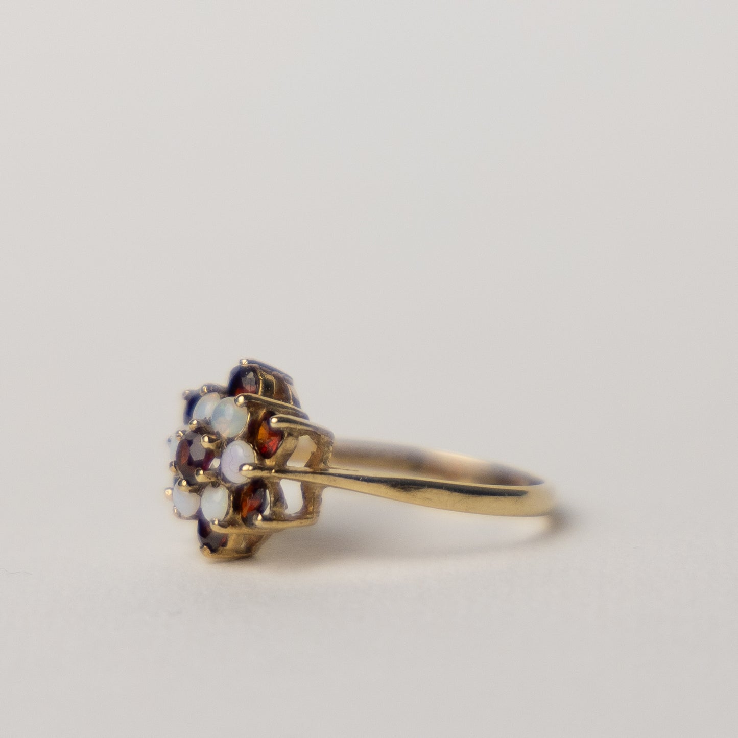 9 carat gold cluster garnet opal ring