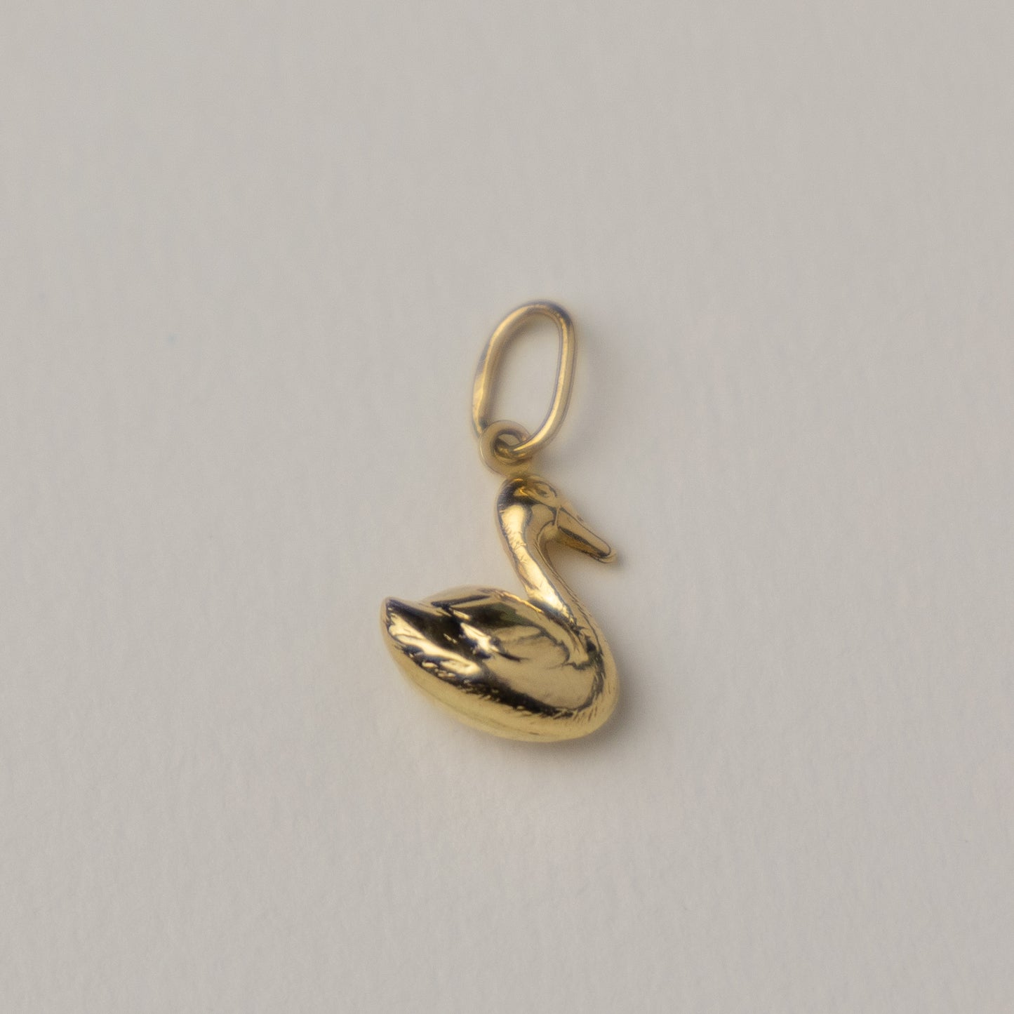 14 carat gold swan pendant