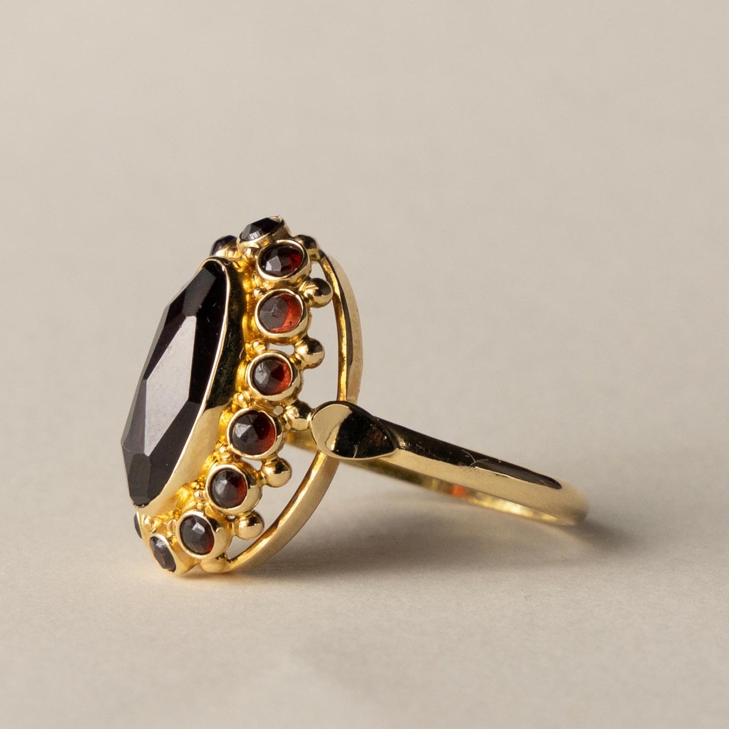 14ct garnet entourage ring