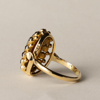 14ct garnet entourage ring