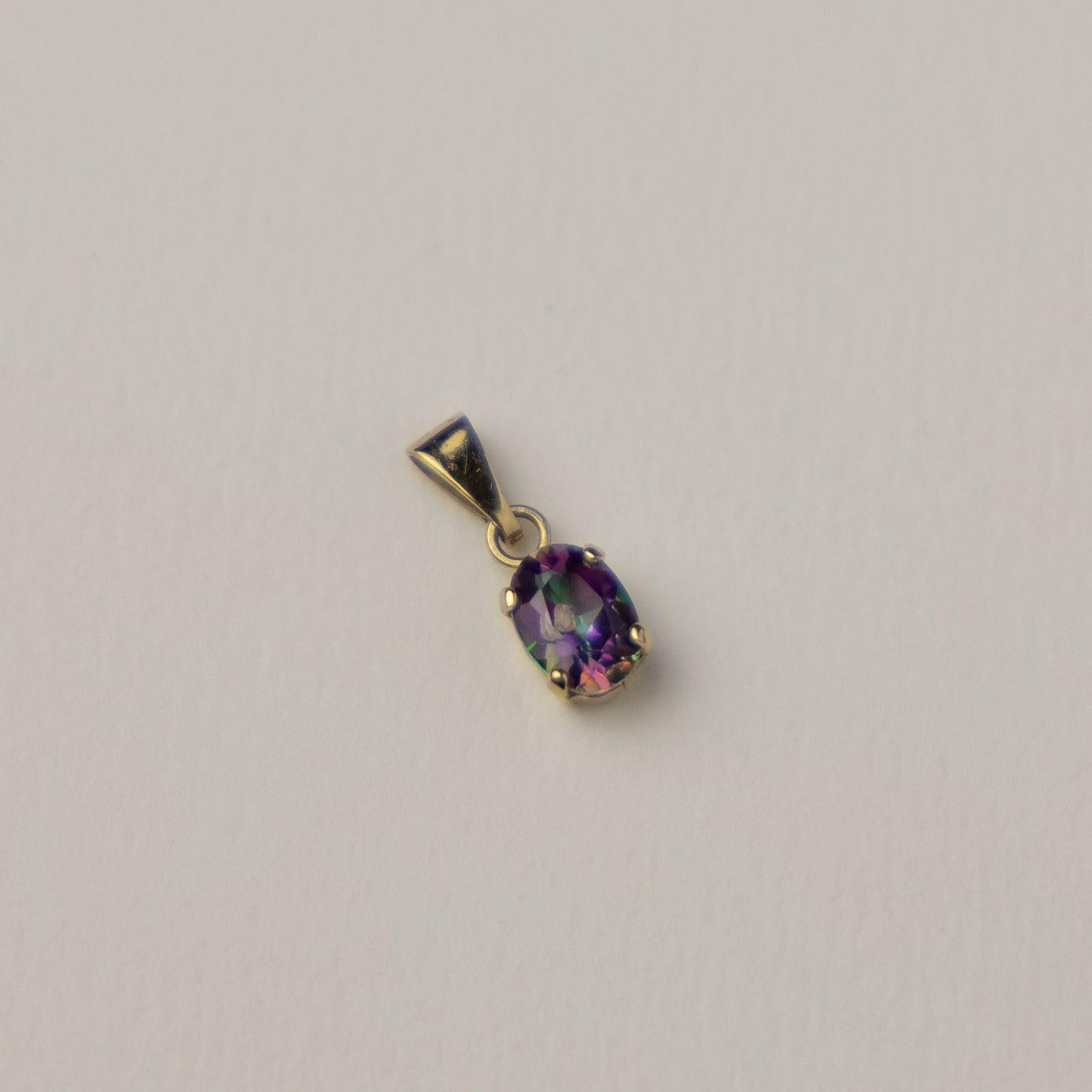 14 carat gold mystic topaz pendant