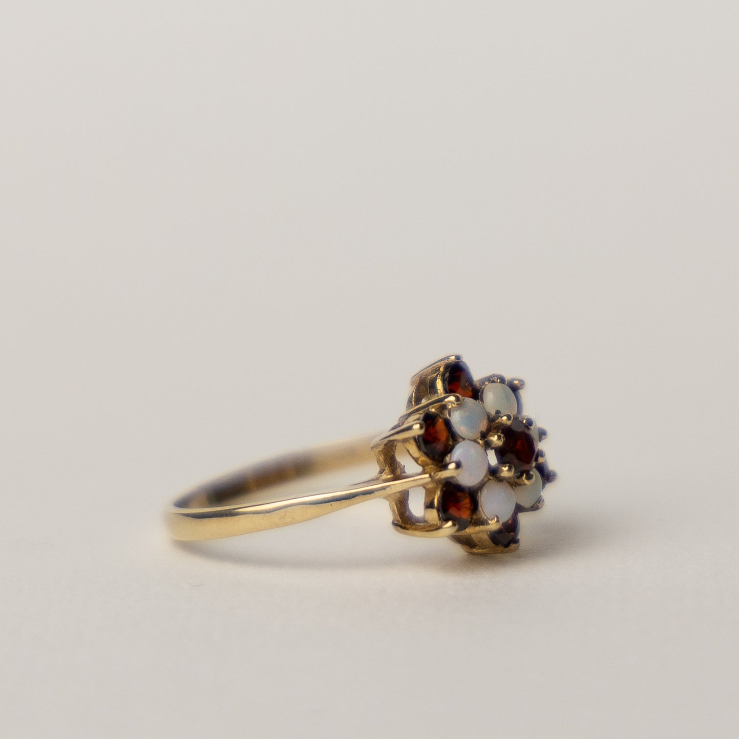 9 carat gold cluster garnet opal ring