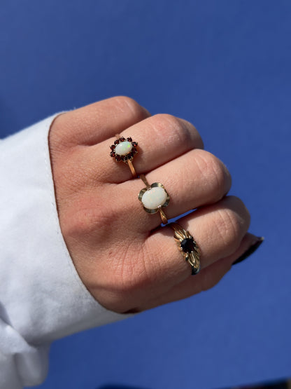 9 carat opal claw set ring