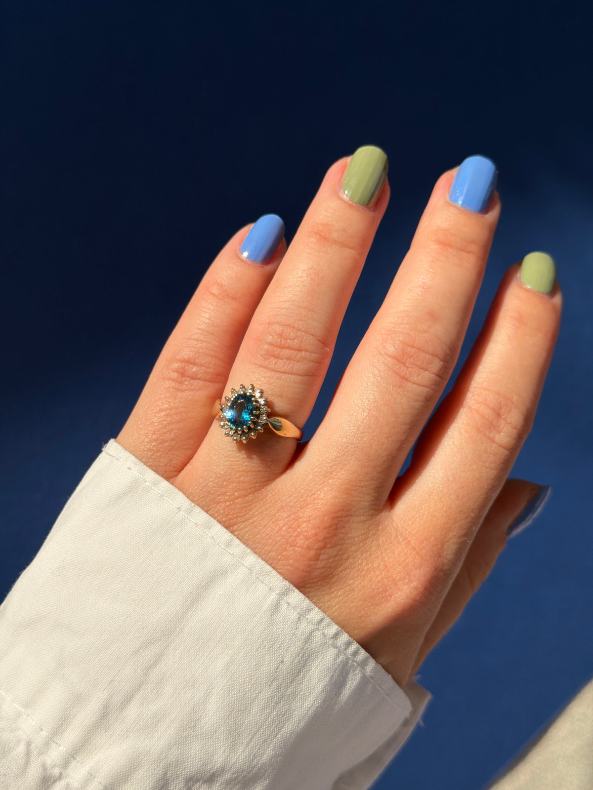 9ct Diana halo blue topaz & diamond
