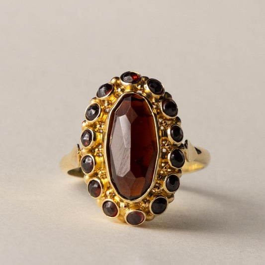 14ct garnet entourage ring
