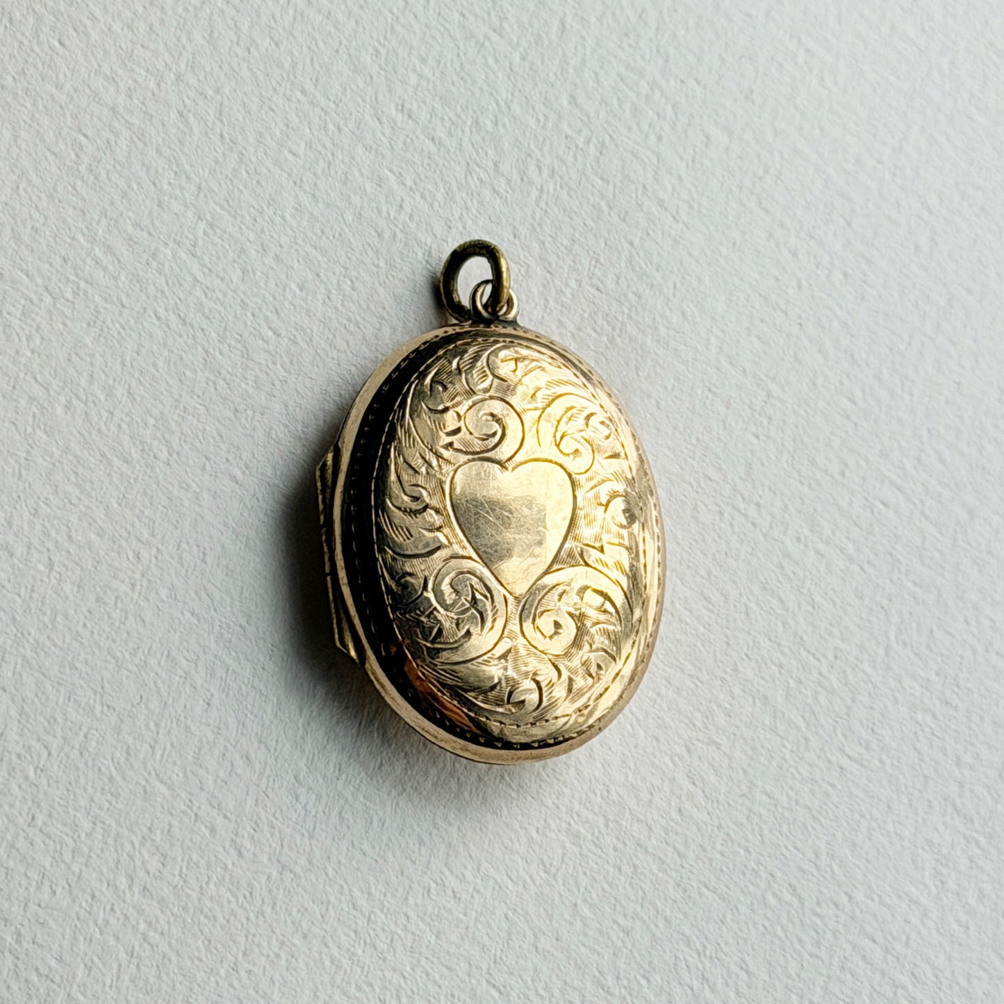 antique 9ct oval engraved locket